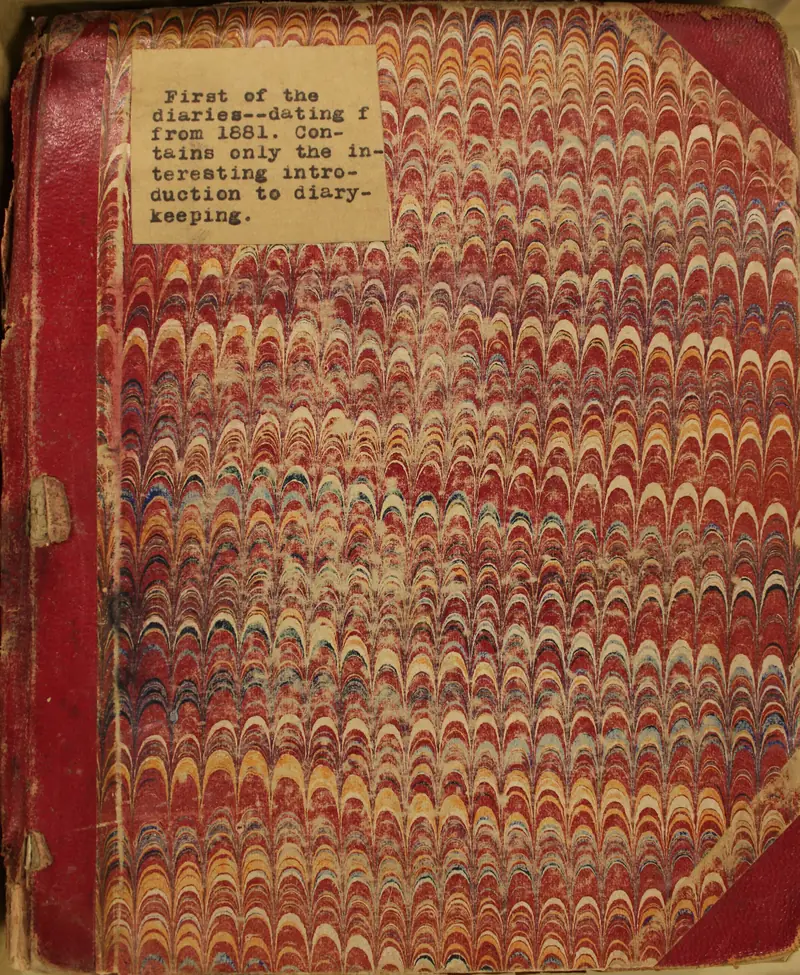 Marbled diary cover with a typed label reading First of the diaries, dating from 1881